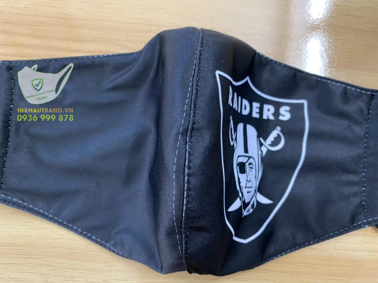 khau trang vai in logo raider (1) khau trang vai in logo raider 1